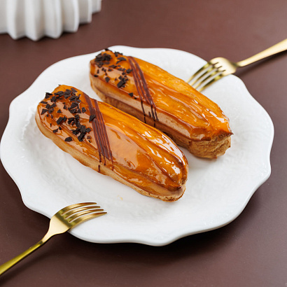 Пирожное Эклер кофе - апельсин 60 г Лавка Пекаря в СПб 2